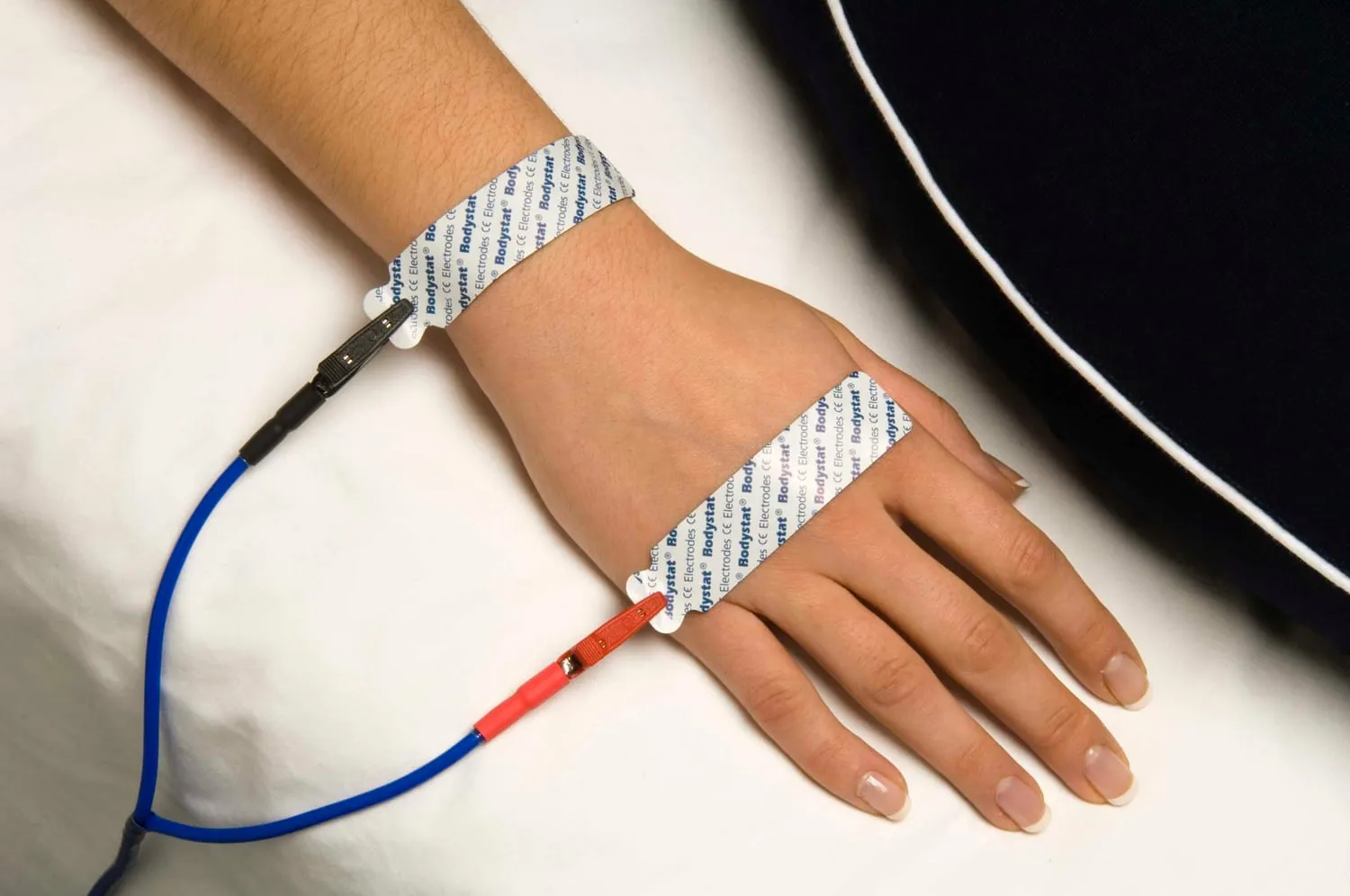 Bodystat bioimpedance electrodes placed for a body composition analysis